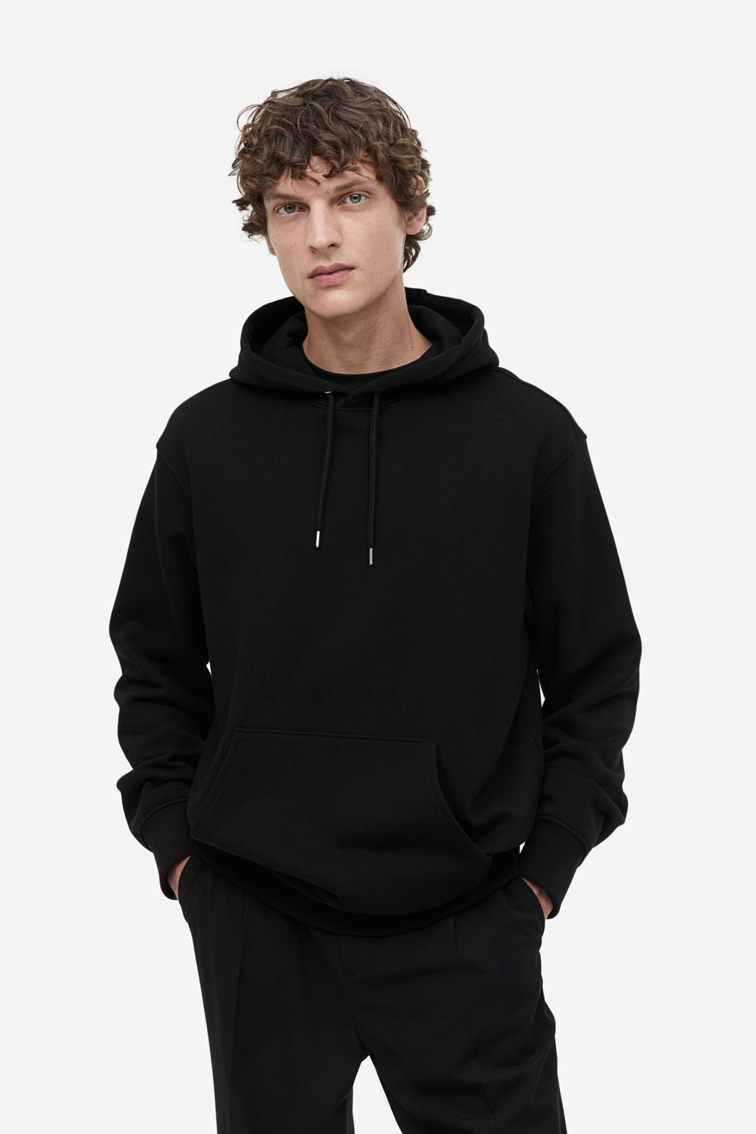 The Power of Black: Why Every Wardrobe Needs a Black Hoodie